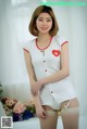 Ye Na hot beauty in nurse-style lingerie (9 photos) P7 No.400ec4