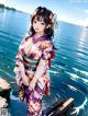 A woman in a kimono standing on a dock by the water.